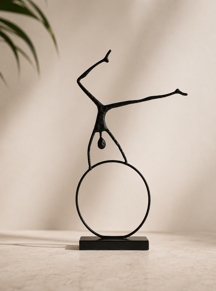 Escultura Hombre en la Rueda 40x8x60 cm