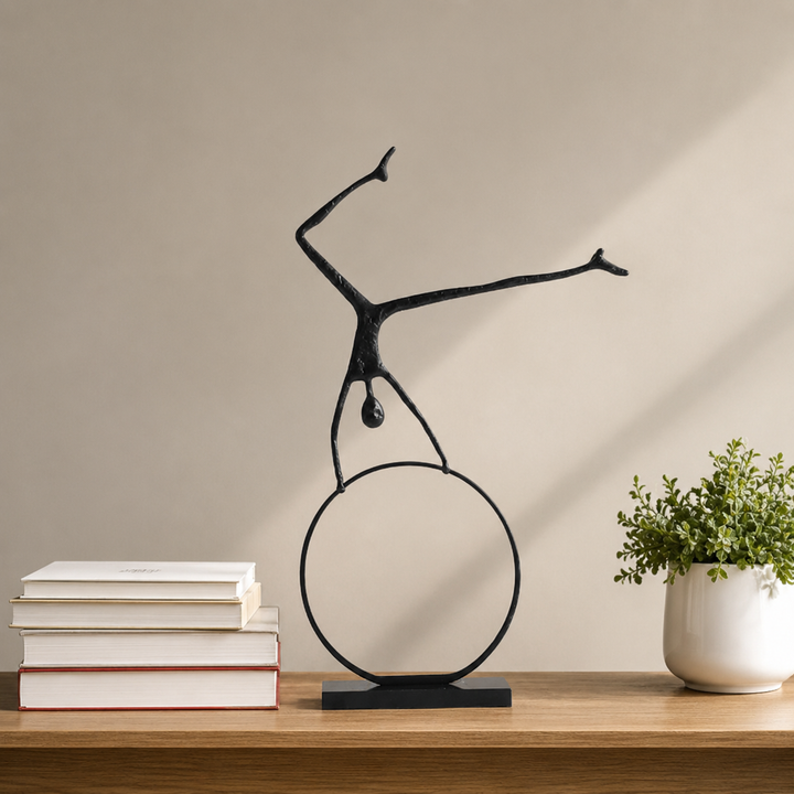 Escultura Hombre en la Rueda 40x8x60 cm