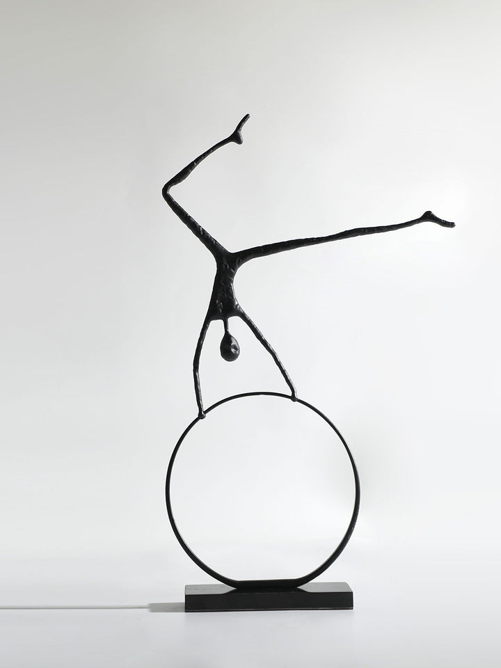Escultura Hombre en la Rueda 40x8x60 cm