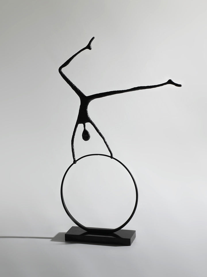 Escultura Hombre en la Rueda 40x8x60 cm